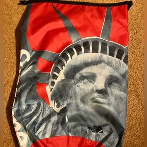Supreme north face Statue of Liberty bag red